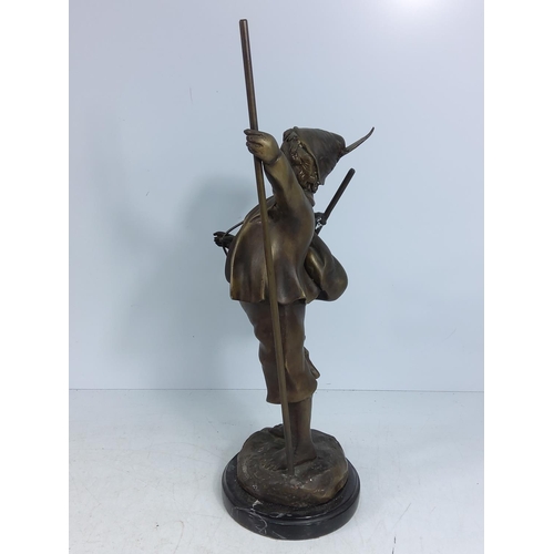 237 - Cast bronze figure of a man on marble base, 40cms in height