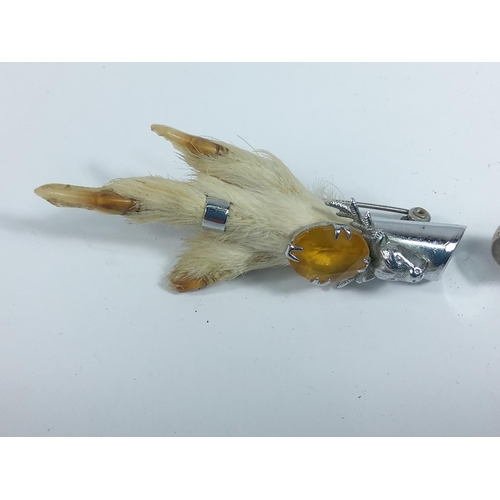 348 - Silver mounted bird foot brooch and one other