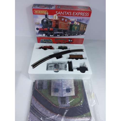 277 - 1 complete Hornby Santa Express set and one for spares (please see images)