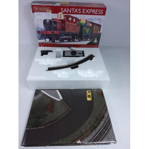 277 - 1 complete Hornby Santa Express set and one for spares (please see images)