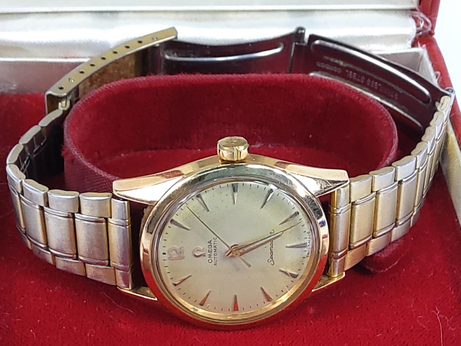 9ct gold Omega Seamaster with strap