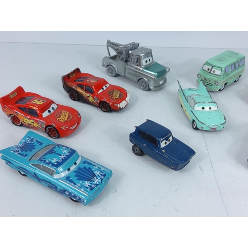 67 - Qty of model vehicles from Disney's film cars, 2 Lightening McQueen and 1 Dinaco Lightening Mc Queen... 