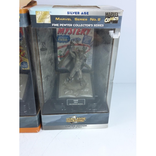 128 - 3 boxed Marvel pewter figures