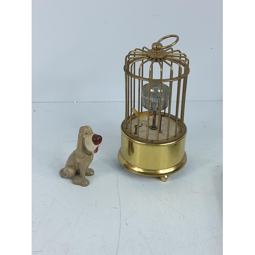 129 - Carriage clock, bird cage clock and interesting items