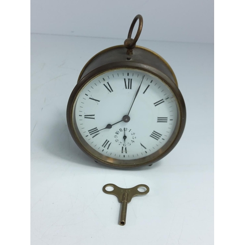 139 - Antique brass cased bedroom clock