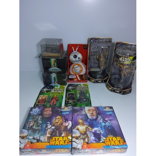 157 - Boxed Star Wars figures and collectables