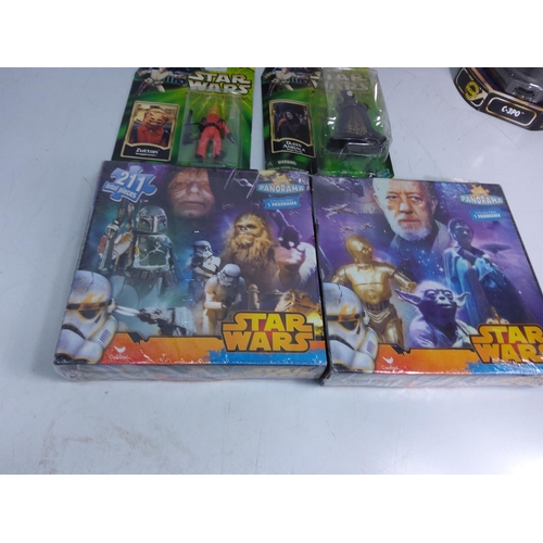 157 - Boxed Star Wars figures and collectables