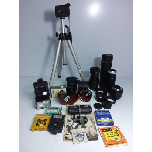 34 - Camera lens, accessories and tripod