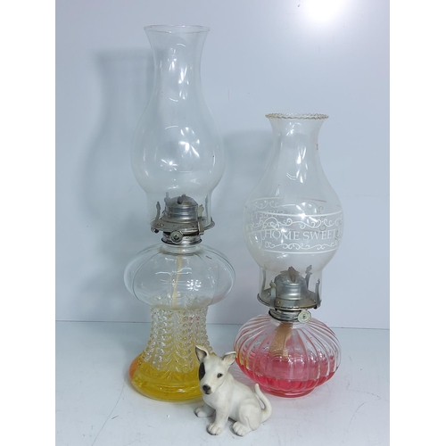 36 - Oil lamps and dog ornament