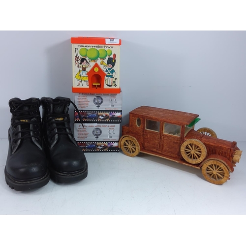 181 - Musical box, headphones, wooden car, a pair of Caterpillar boots size 7 and 2 boxed fog lamps