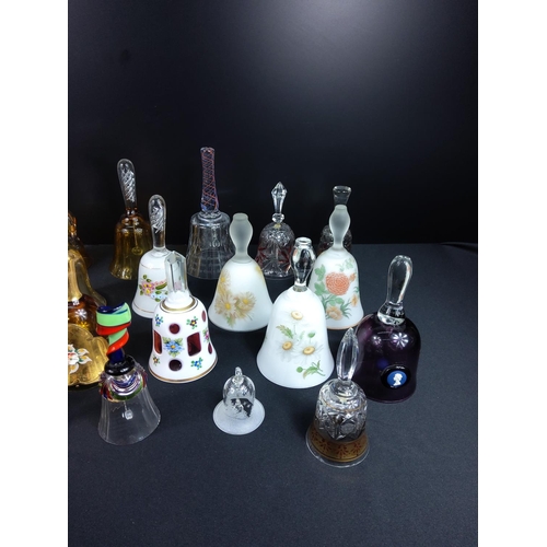 82 - Collection of glass and coloured glass bells including hand decorated and bohemian glass