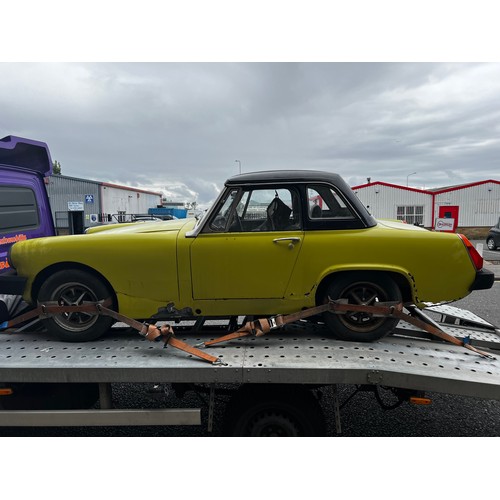 65A - 1975 MG Midget convertible project car in yellow. (No Reserve). Registration JMM957P.
This car runs ... 