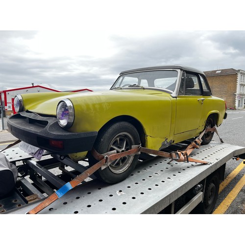 65A - 1975 MG Midget convertible project car in yellow. (No Reserve). Registration JMM957P.
This car runs ... 