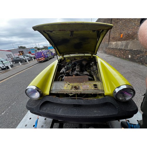 65A - 1975 MG Midget convertible project car in yellow. (No Reserve). Registration JMM957P.
This car runs ... 