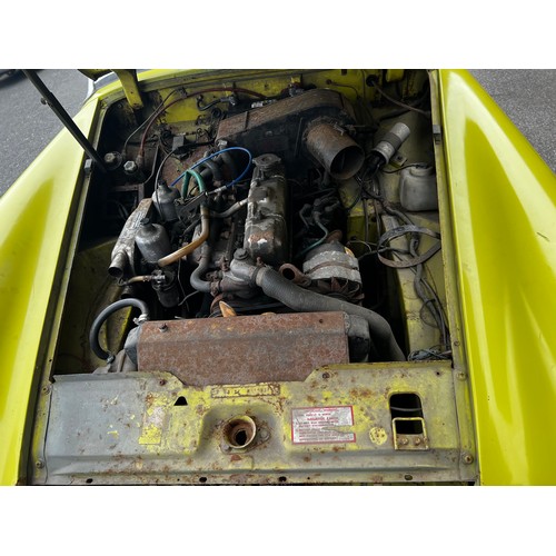 65A - 1975 MG Midget convertible project car in yellow. (No Reserve). Registration JMM957P.
This car runs ... 