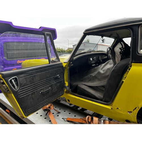 65A - 1975 MG Midget convertible project car in yellow. (No Reserve). Registration JMM957P.
This car runs ... 