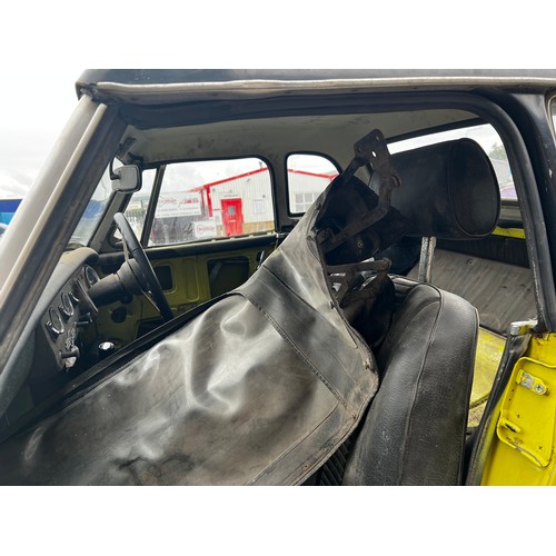 65A - 1975 MG Midget convertible project car in yellow. (No Reserve). Registration JMM957P.
This car runs ... 