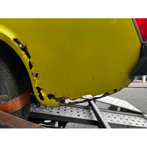 65A - 1975 MG Midget convertible project car in yellow. (No Reserve). Registration JMM957P.
This car runs ... 