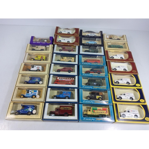 11 - 30 boxed model vehicles