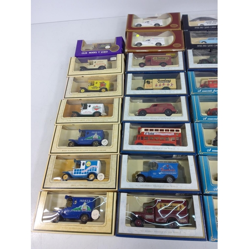 11 - 30 boxed model vehicles