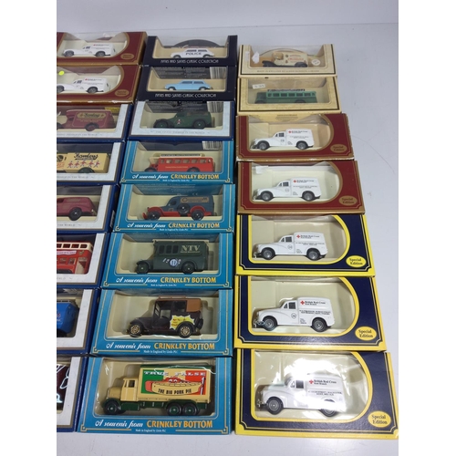 11 - 30 boxed model vehicles