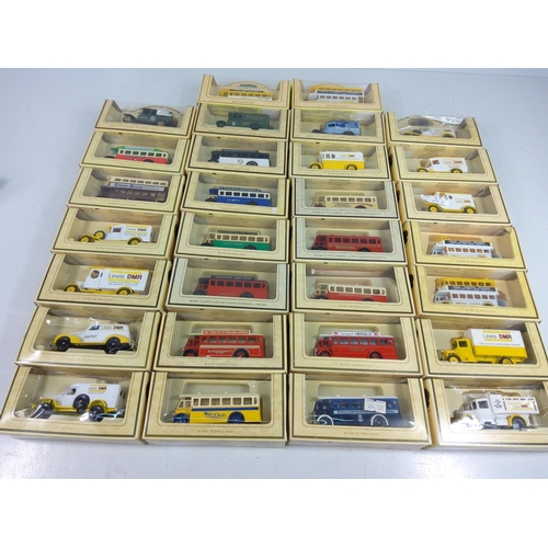 13 - 30 boxed model vehicles