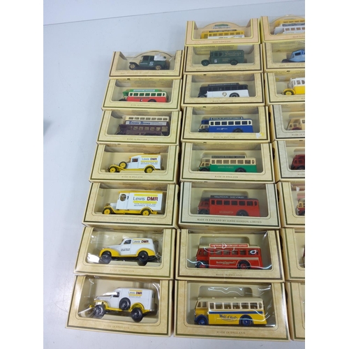 13 - 30 boxed model vehicles