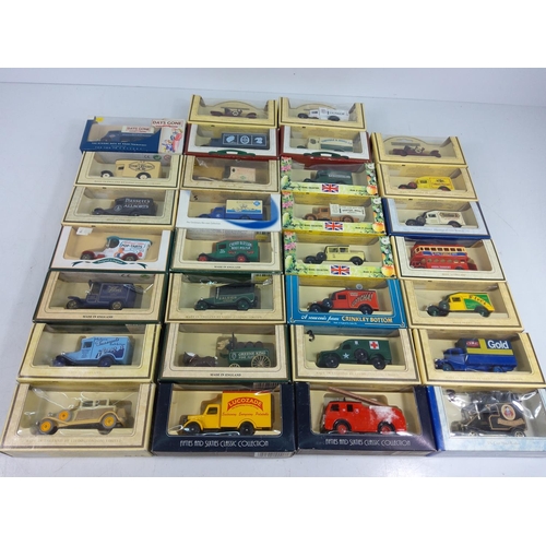 17 - 30 boxed model vehicles