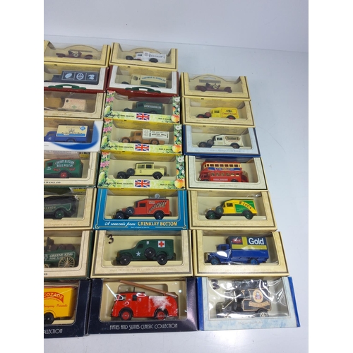 17 - 30 boxed model vehicles