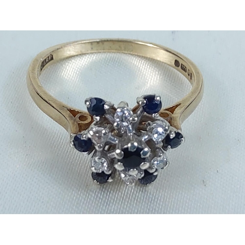 194 - 9ct gold sapphire and diamond cluster ring, size S