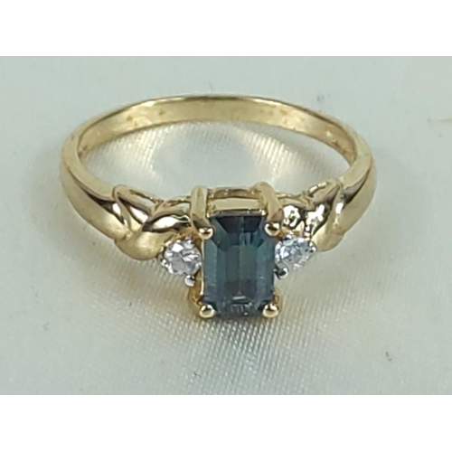 197 - 9ct gold topaz and diamond ring, size N