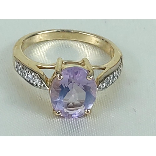 199 - 9ct gold amethyst and diamond ring