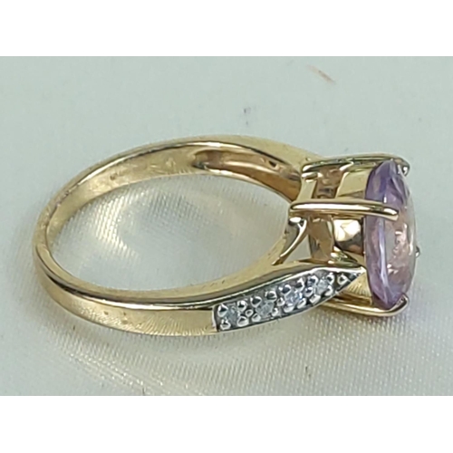 199 - 9ct gold amethyst and diamond ring