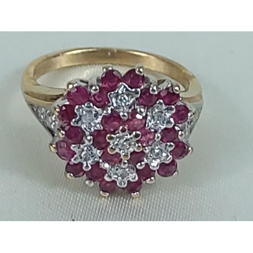 202 - 9ct gold garnet and diamond cluster ring, size L