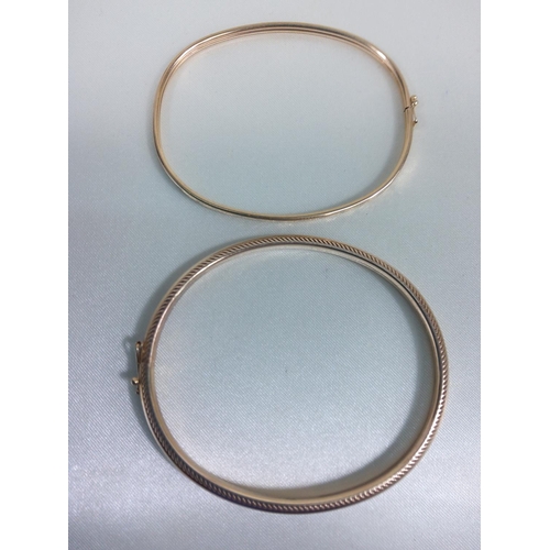 210 - 2 9ct gold bangles, 7.3g