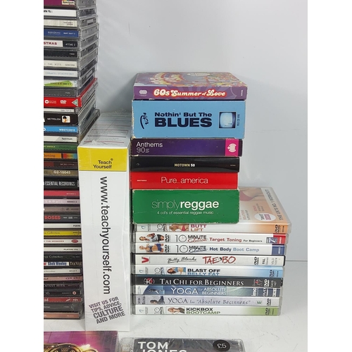 31 - 3 boxes of CD's and DVDs, some new