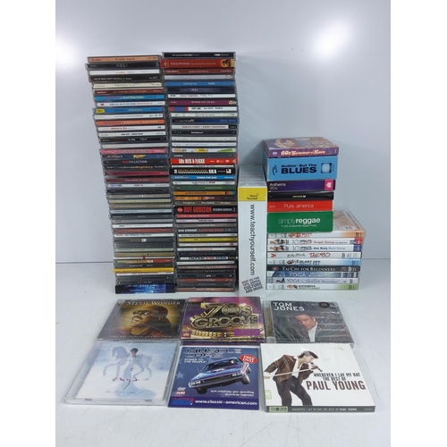 31 - 3 boxes of CD's and DVDs, some new