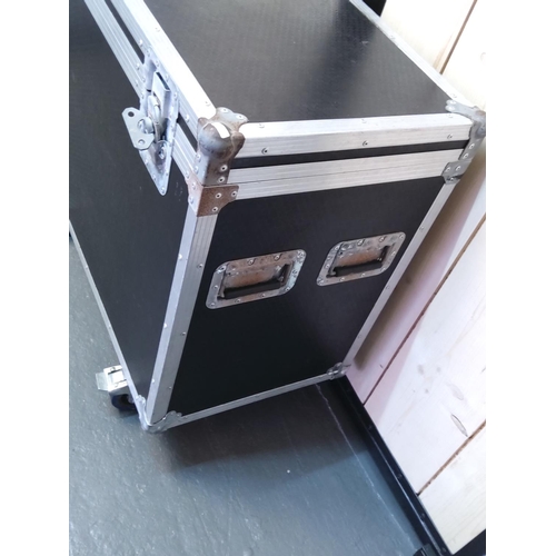 60 - Travelling case and a pair of microphone stands