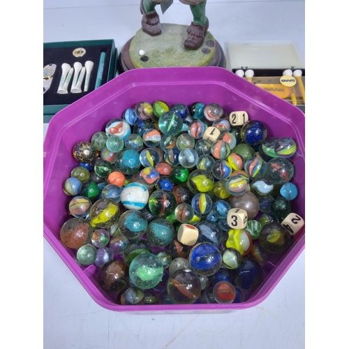 9 - Marbles, golfing figure and golfing tees