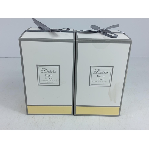 101 - 2 boxed fresh linen candles