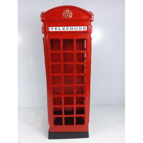 107 - Cast metal telephone box stick stand, 58cms in height