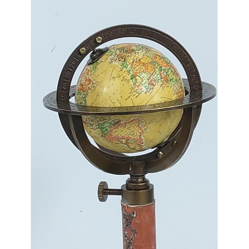 130 - Small terrestrial globe on stand