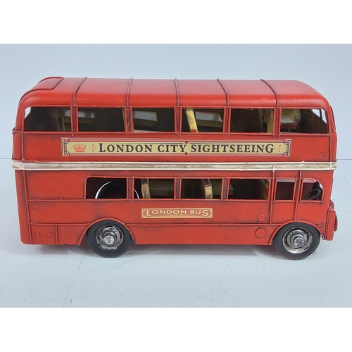 141 - Tin plate model London bus