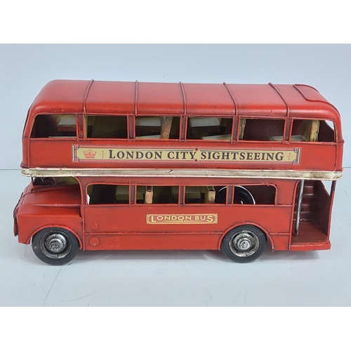 141 - Tin plate model London bus