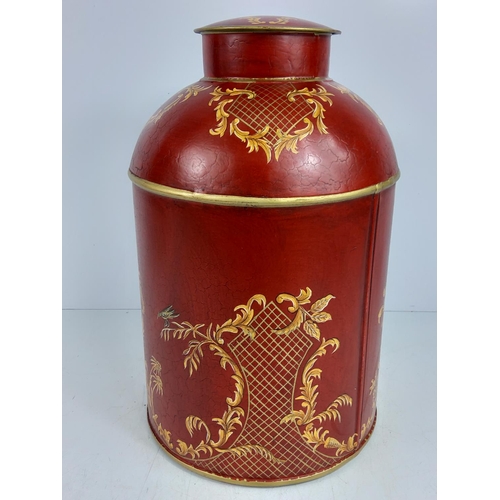 156 - Large oriental decorated metal tea caddy, 37cms in height