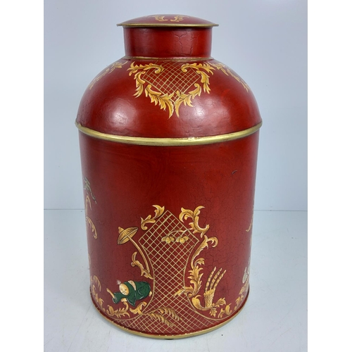 156 - Large oriental decorated metal tea caddy, 37cms in height