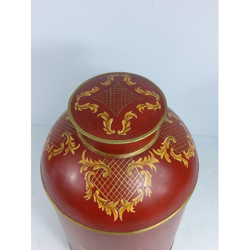 156 - Large oriental decorated metal tea caddy, 37cms in height