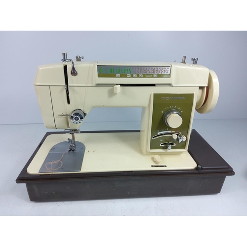 165 - 2 Toyota sewing machines