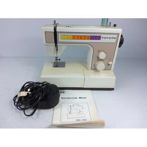 165 - 2 Toyota sewing machines