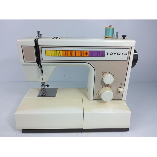 165 - 2 Toyota sewing machines